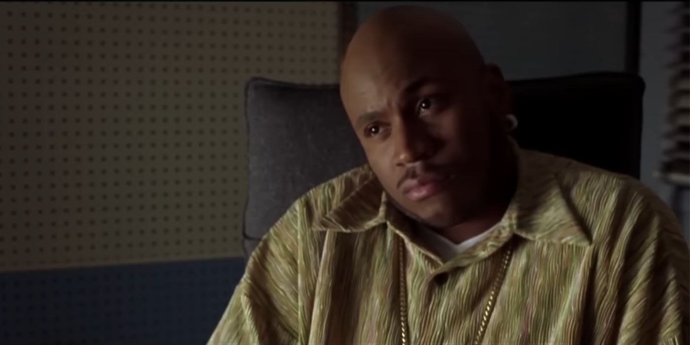 LL Cool J as Dwayne Keith God Gittens stares at an off-screen Omar Epps as Reid in In Too Deep.
