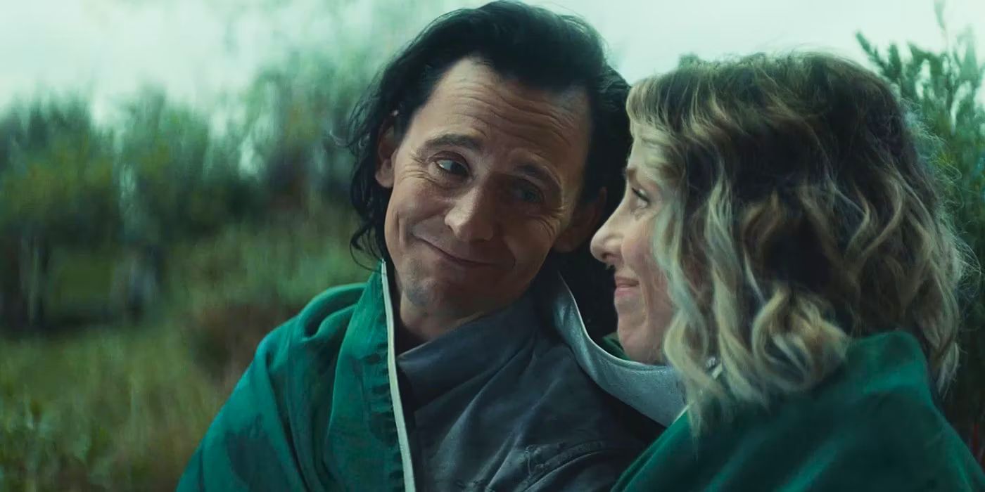 Loki (Tom Hiddleston) and Sylvie (Sophia Di Martino) smile at each other in Loki season 1