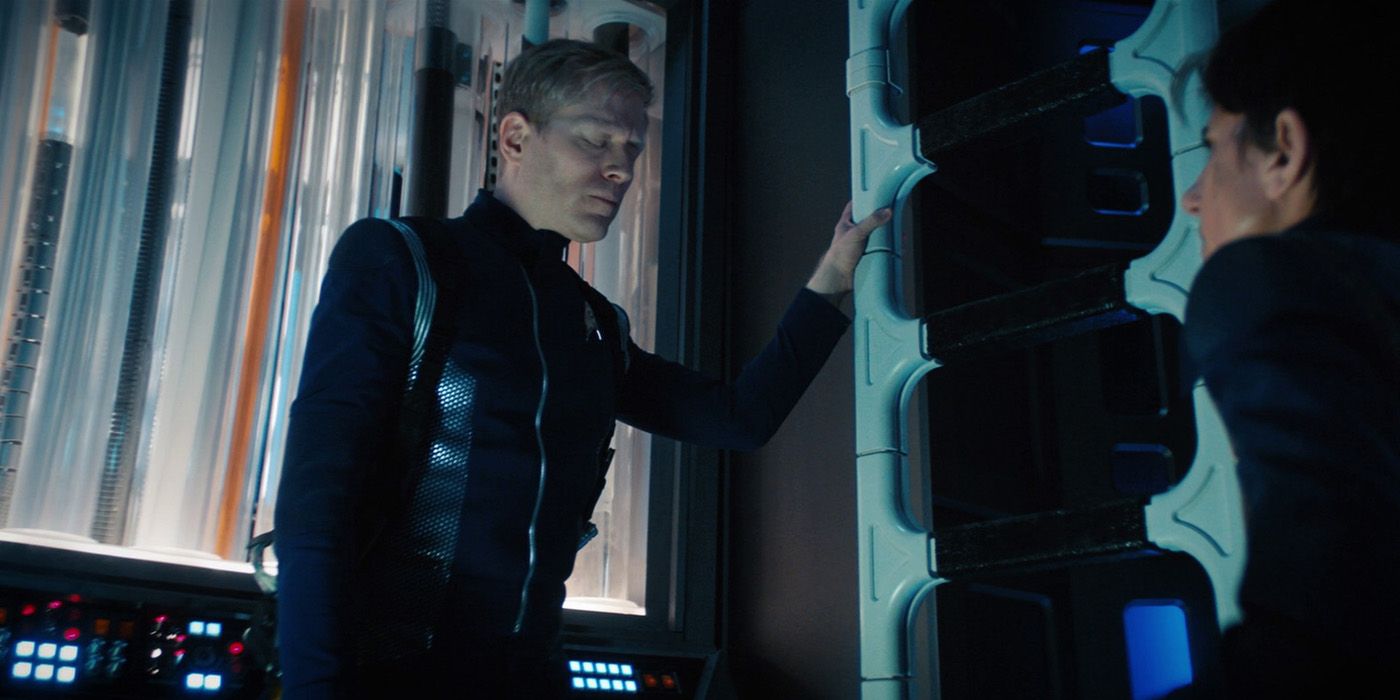 Lt Cdr Paul Stamets braces against a wall in engineering on Star Trek Discovery
