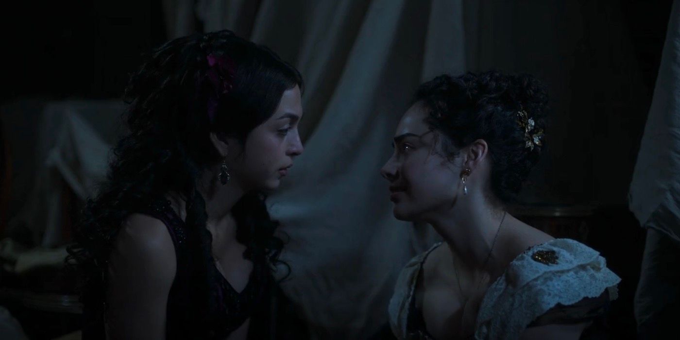 Mabel and Lizzy speaking to one another.