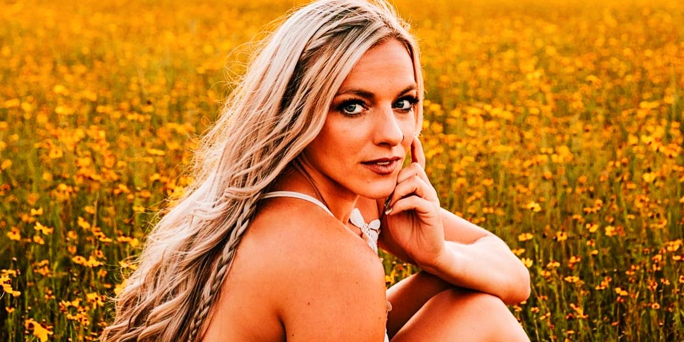 Mackenzie McKee from Teen Mom sitting in sunflower field with somber expression