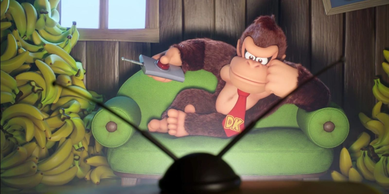 Mario Vs Donkey Kong DK on a sofa watching tv