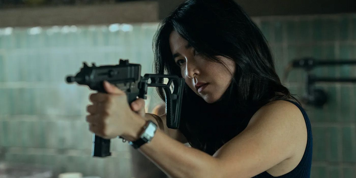 Maya Erskine as Jane Smith shooting from a shotgun in Mr & Mrs Smith Show