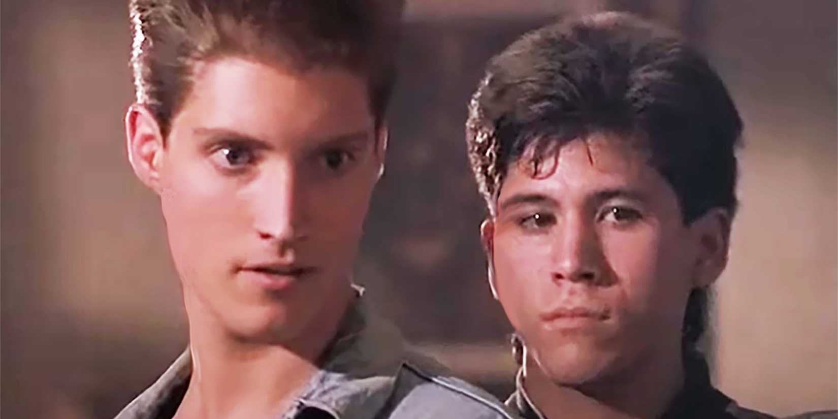 Mike Barnes and Dennis looking at someone in The Karate Kid Part 3