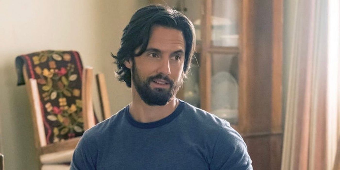 Milo Ventimiglia wearing a blue shirt and standing in dining room 