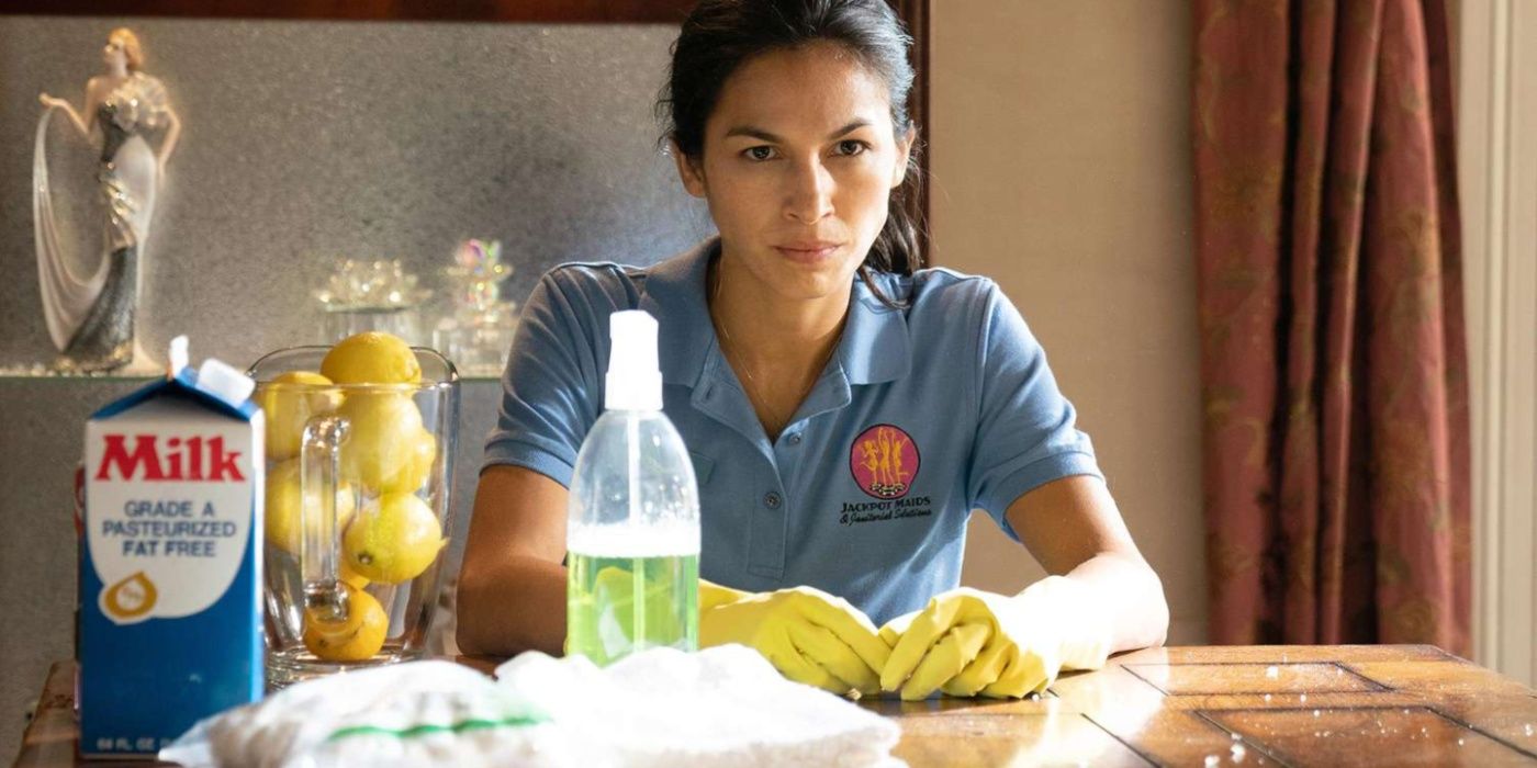 Thony (Elodie Yung) with cleaning supplies in The Cleaning Lady