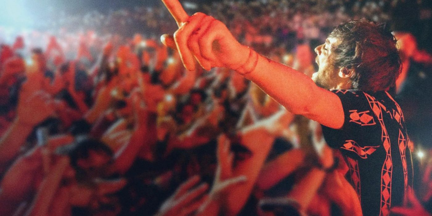 Louis Tomlinson in front of a crowd in All of Those Voices