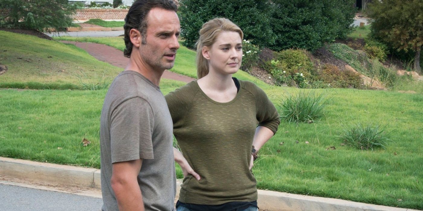 Jessie (Alexandra Breckenridge) and Rick (Andrew Lincoln) stand on a driveway in The Walking Dead