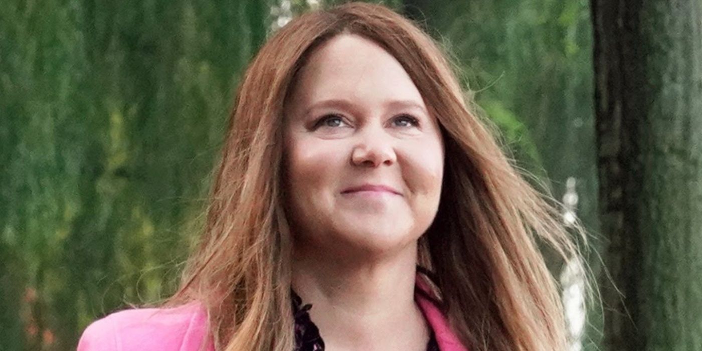 Amy Schumer smiling on Saturday Night Live