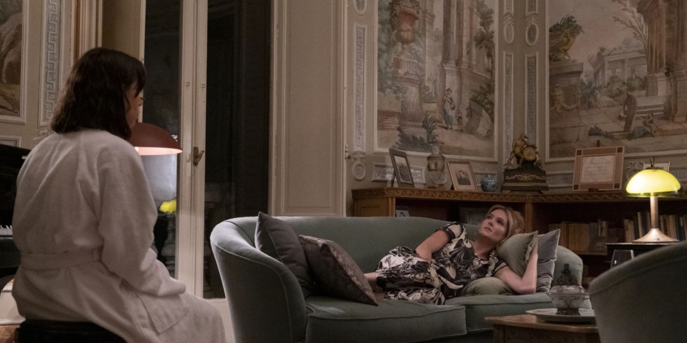 Harper (Aubrey Plaza) and Daphne (Meghann Fahy) sitting on in the palazzo in The White Lotus