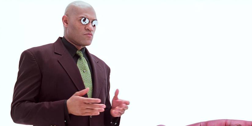 Laurence Fishburne as Morpheus explaining something in The Matrix