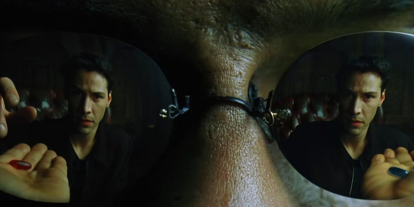 Neo reflected in Morpheus' glasses in The Matrix
