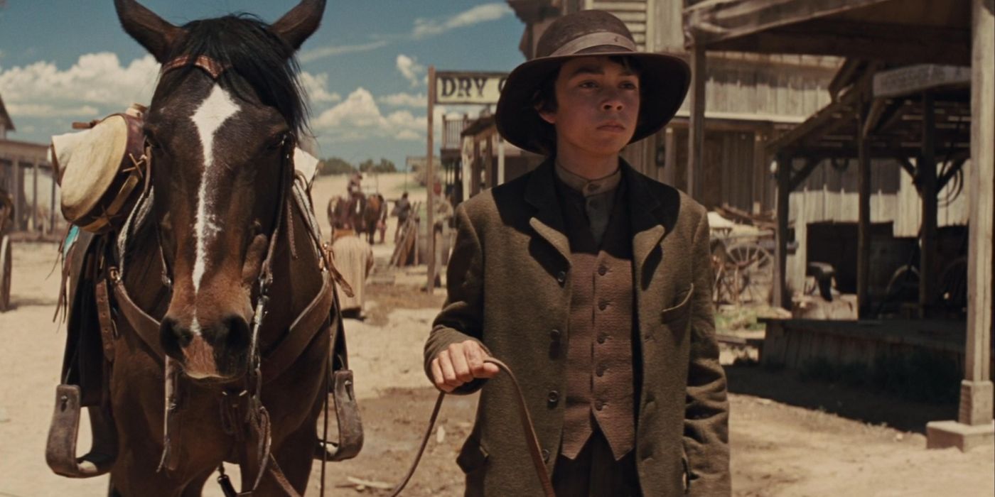 Noah Ringer as Emmett Taggart in Cowboys & Aliens.