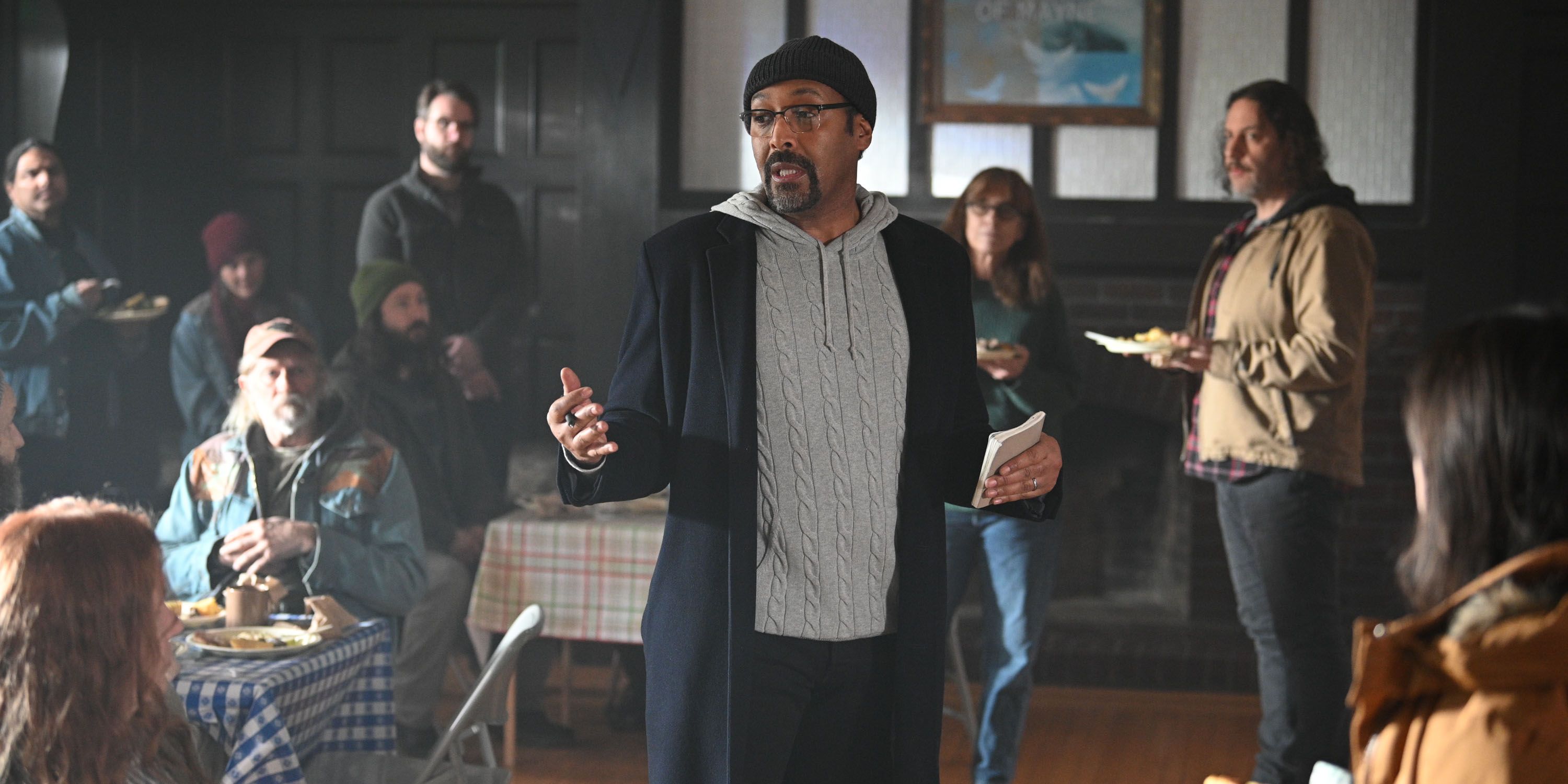 Jesse L. Martin as Alec Mercer talking to a group of people in The Irrational 108.