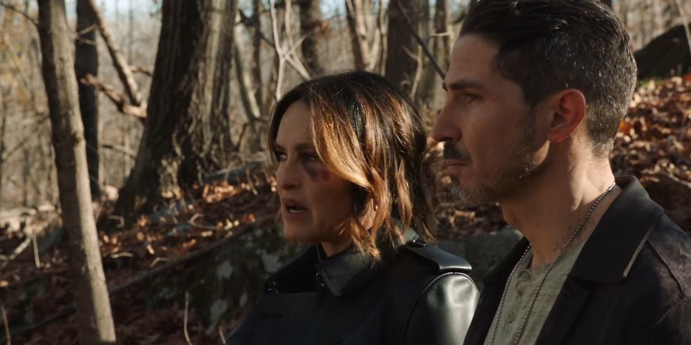 Olivia Benson (Mariska Hargitay) with a black eye and Mike Duarte (Maurice Compte) looking together at a tree in SVU.