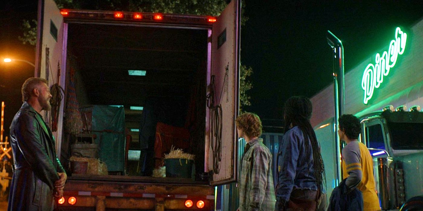 Percy, Annabeth, Grover, and Ares standing in front of an animal transportation truck in Percy Jackson episode 5