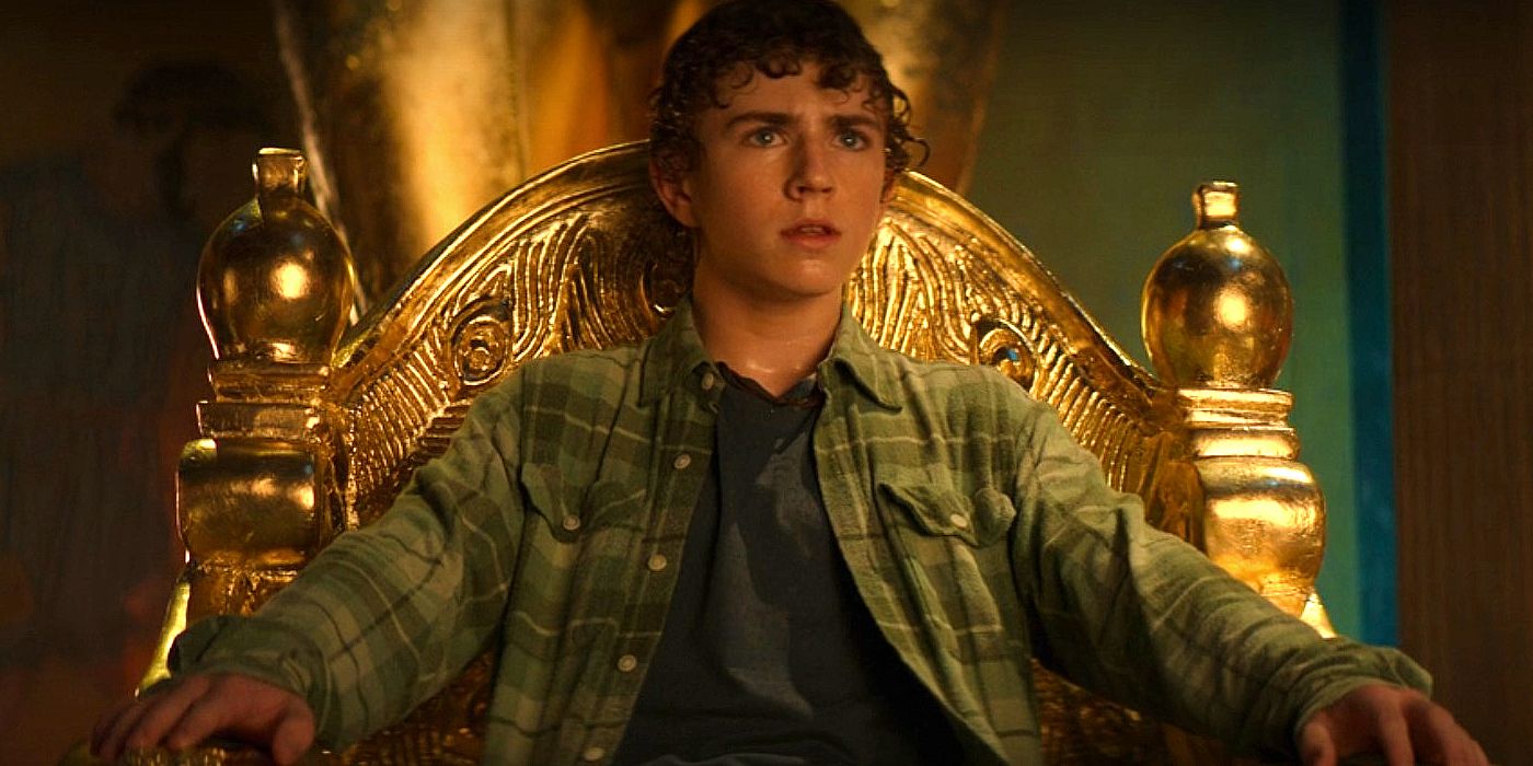 Walker Scobell as Percy Jackson looking worried sitting on Hephaestus' golden throne in Percy Jackson episode 5