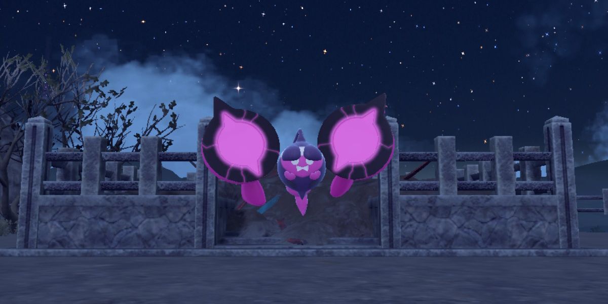 Pecharunt in its open form in front of Loyalty Plaza in Kitakami in Pokemon Scarlet and Violet.