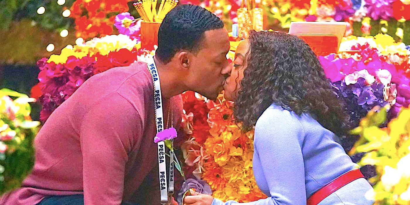 Quinta Brunson's Janine and Tyler James Williams' Gregory kiss among the flowers at Abbott Elementary.