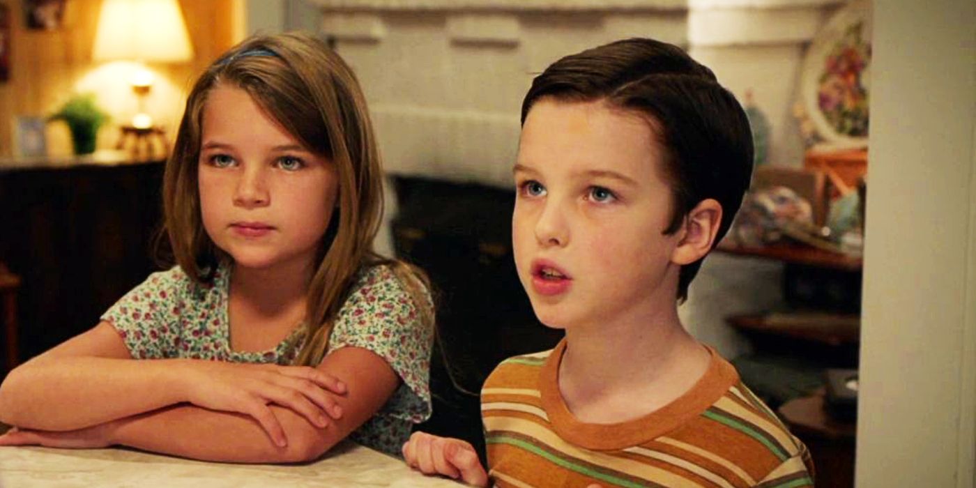 Raegan Revord as Missy and Iain Armitage looking up at a table in Young Sheldon 