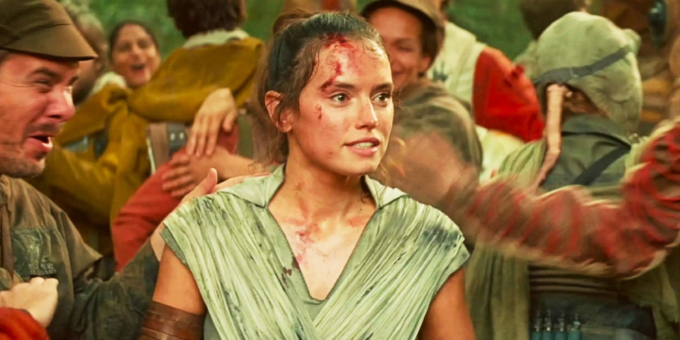 Rey (Daisy Ridley) surrounded by celebrating Rebels in Star Wars: The Rise of Skywalker
