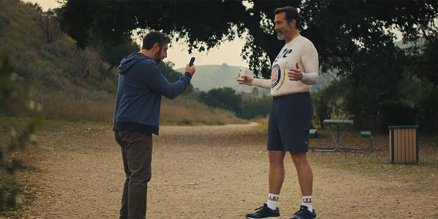Rob Riggle being scanned in Miller Lite ad