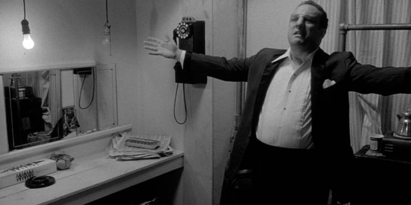 Robert De Niro as Jake LaMotta in Raging Bull's ending.