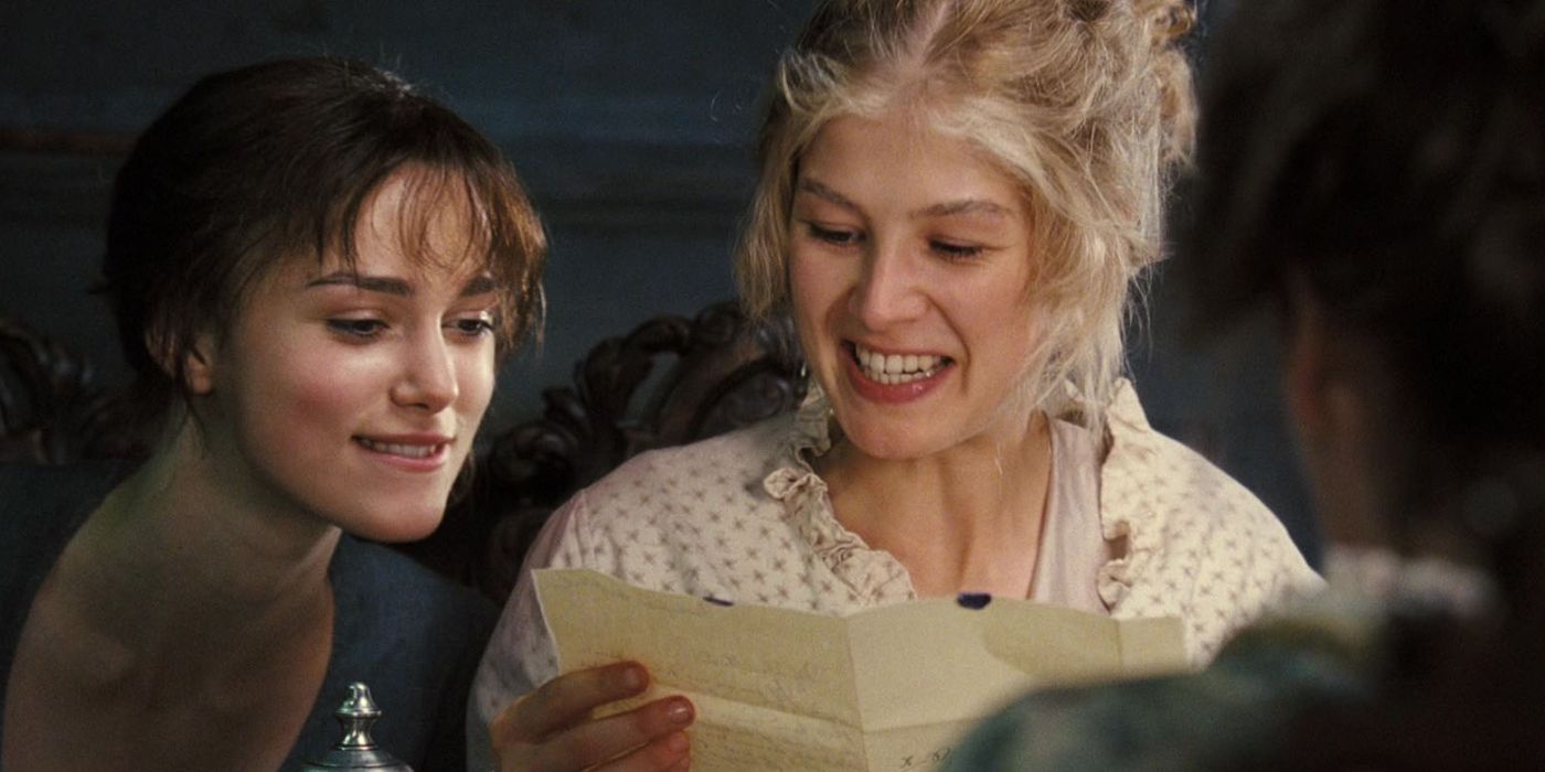 Rosamund Pike and Keira Knightley read a letter with excitement in Pride and Prejudice