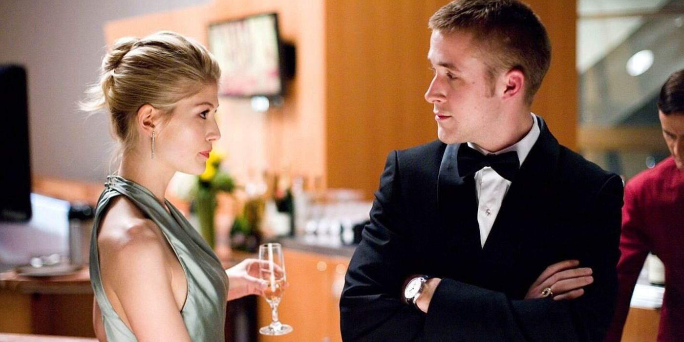 Rosamund Pike and Ryan Gosling chat at a party in Fracture