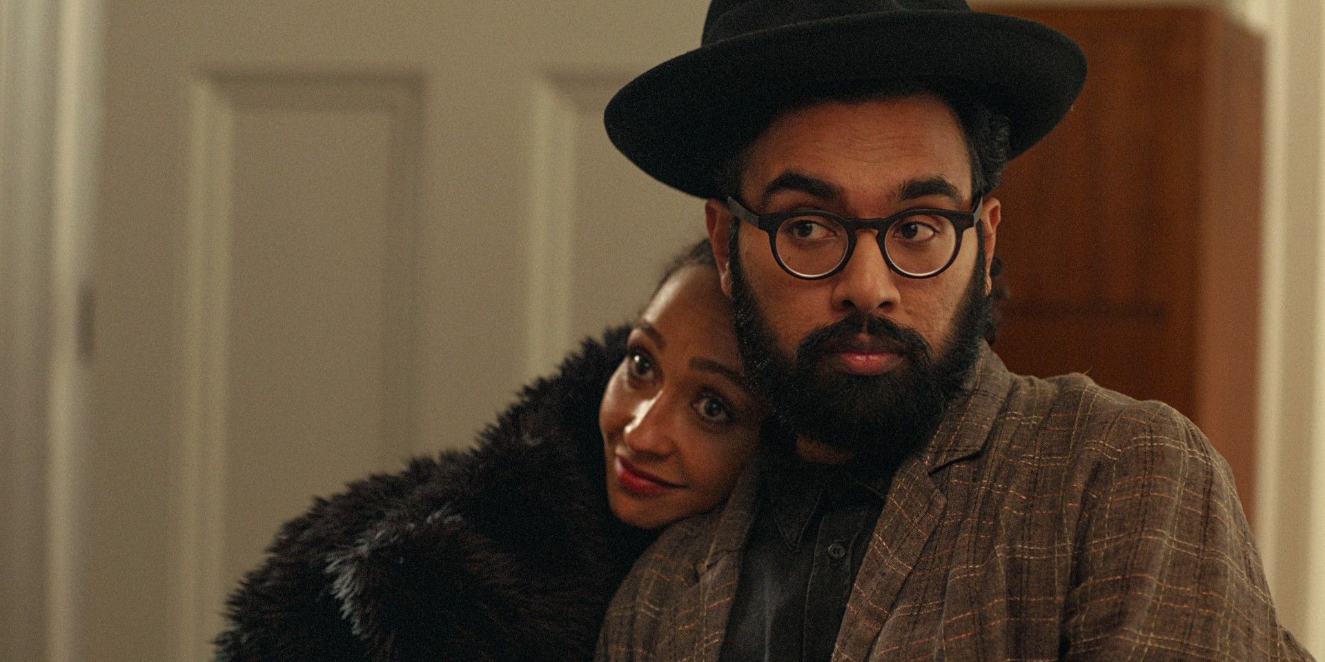 Ruth Negga and Himesh Patel cuddle in Good Grief
