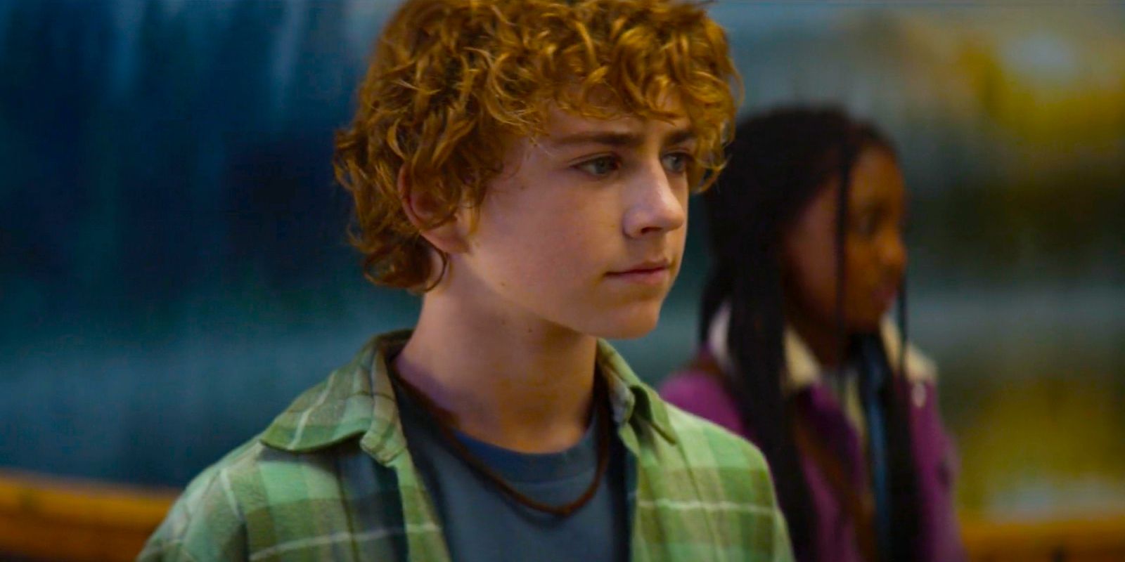 Percy Jackson looking off with Annabeth in the background in Percy Jackson and the Olympians season 1 episode 4