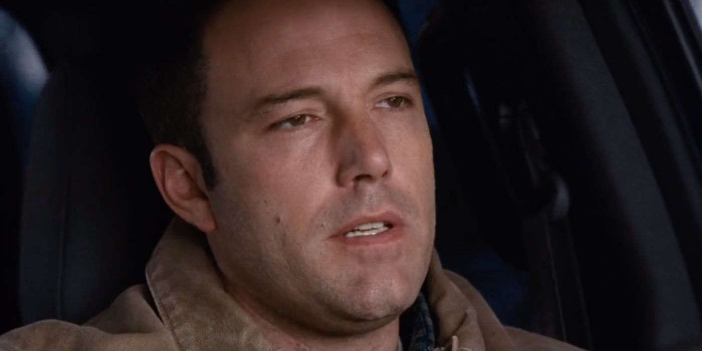 Ben Affleck as Christian Wolff driving a car looking ahead in The Accountant