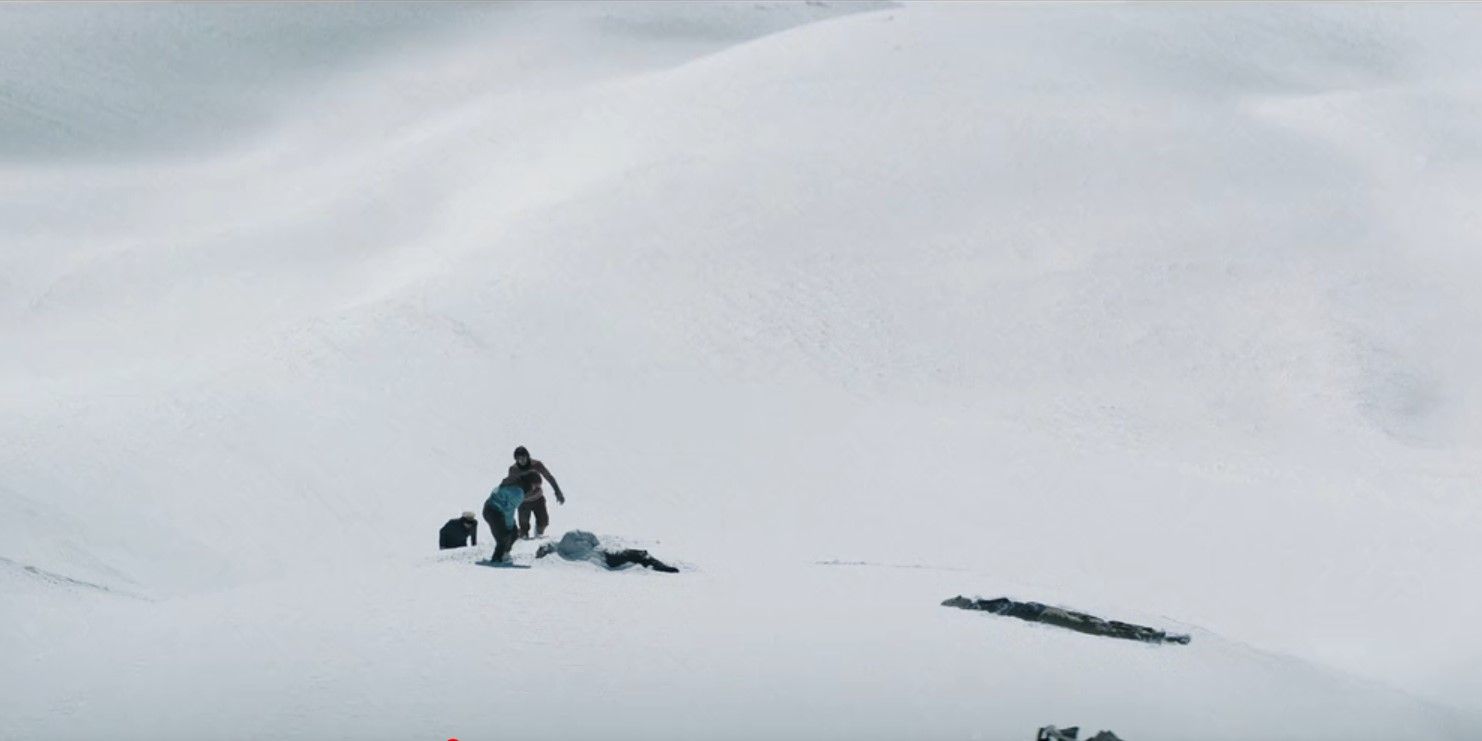 The survivors find bodies while searching for the tail in Society of the Snow.