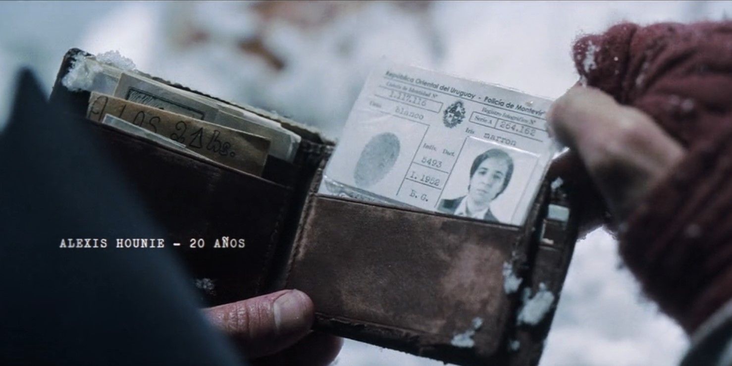 The wallet of Alexis Hounie (Toto Rovito) is found in Society of the Snow.