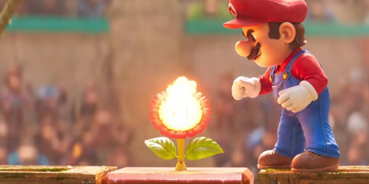 Mario looking at a fire flower in The Super Mario bros. Movie.