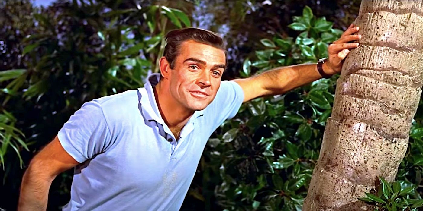 James Bond, de Sean Connery, encostado em uma palmeira em Dr.