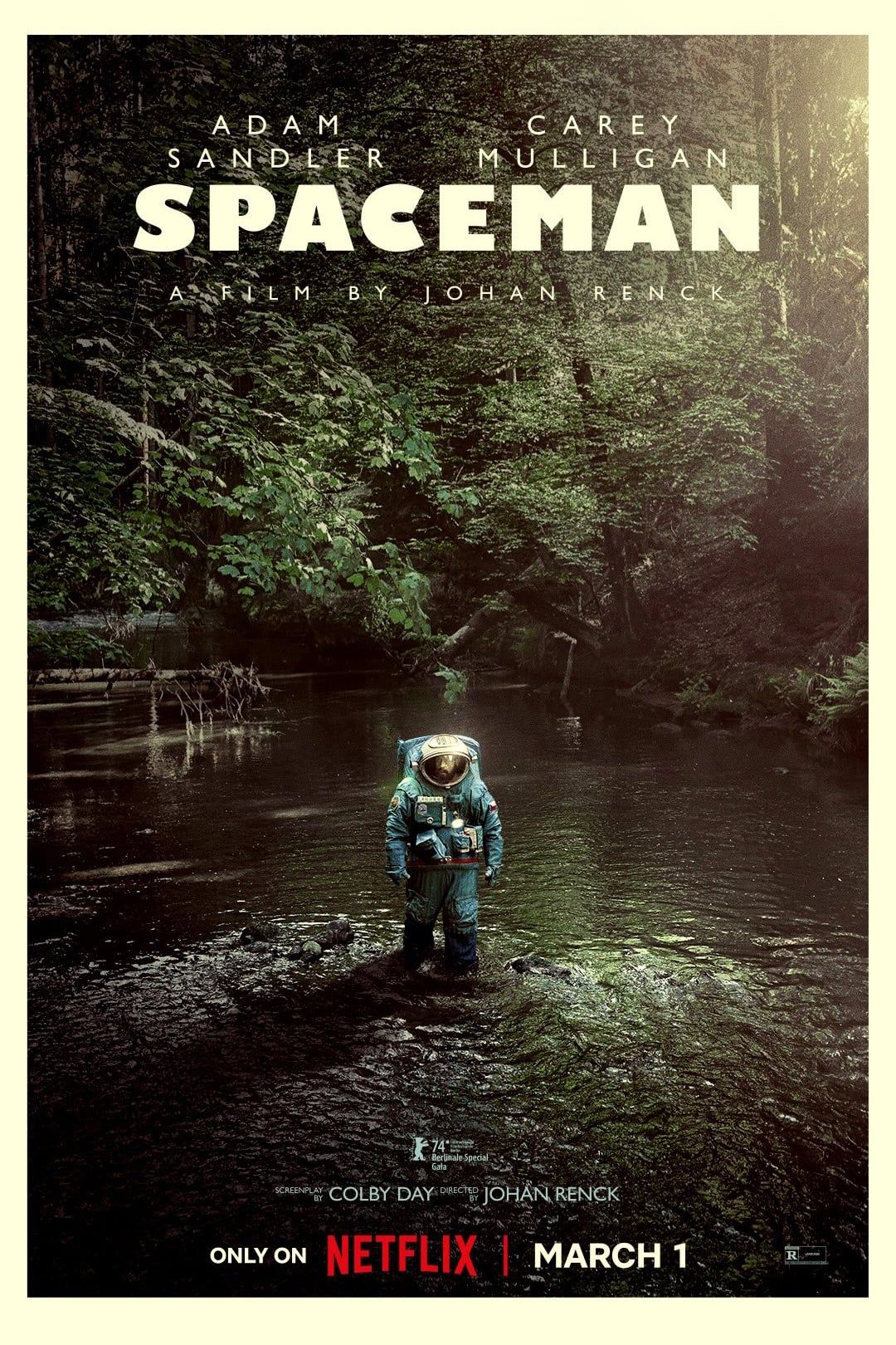 Spaceman Poster Showing Adam Sandler Walking Through a Forest in an Astronaut Suit