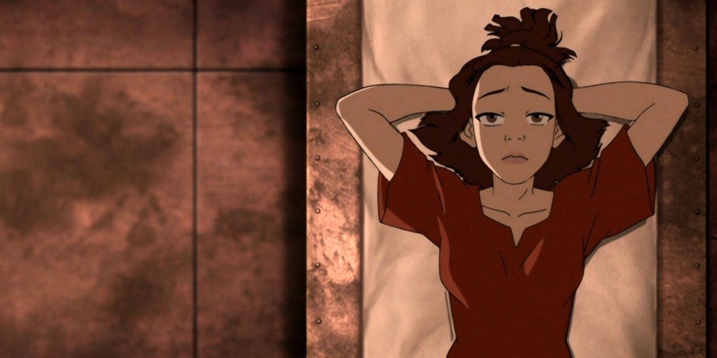 Suki lying on a bed in her cell on the Boiling Rock in Avatar The Last Airbender