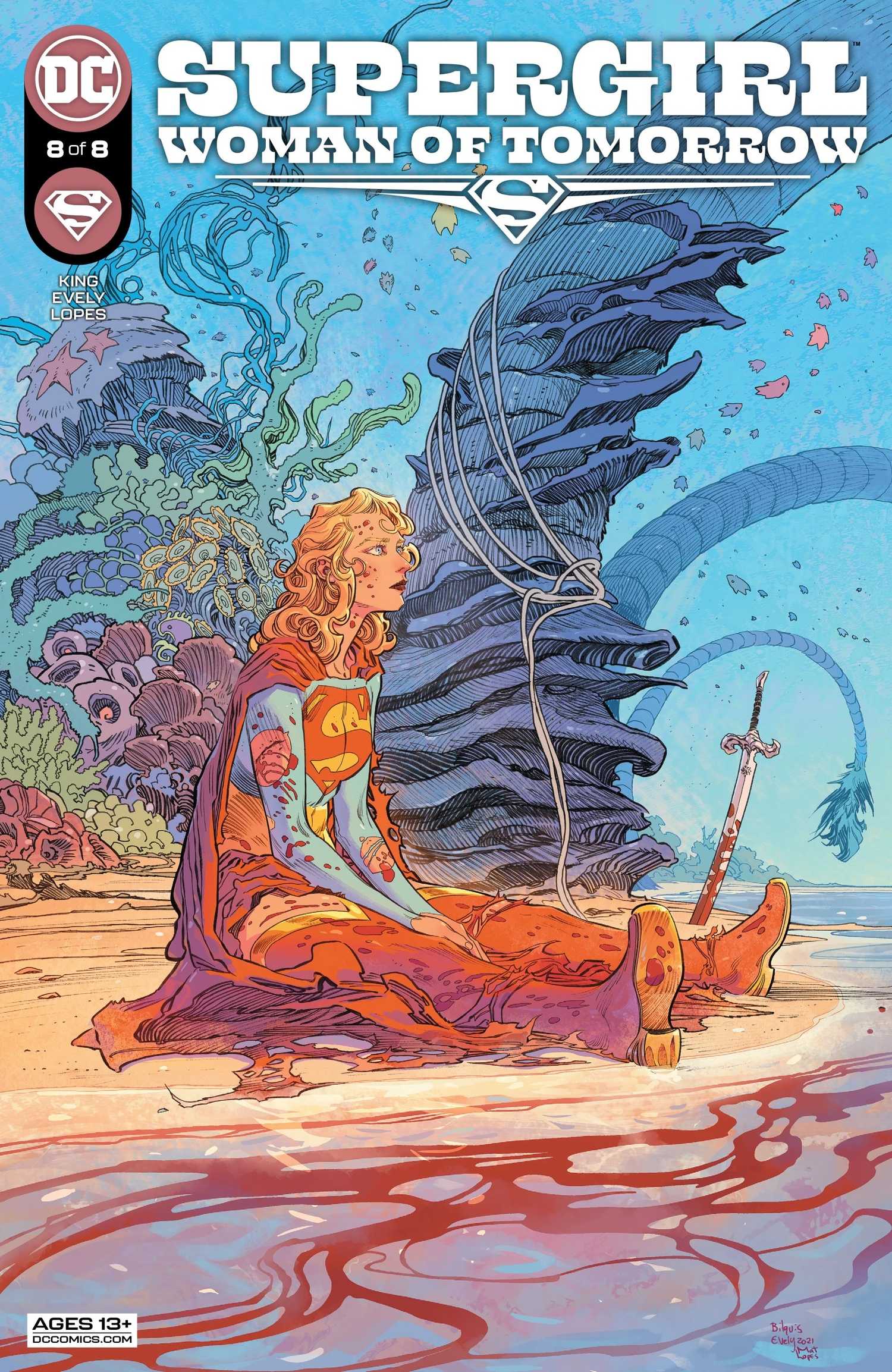 Supergirl sits on an alien beach, surrounded by coral-like structures. Her costume is torn and she is bloodied from battle; a bloody sword sits next to her in the sand.