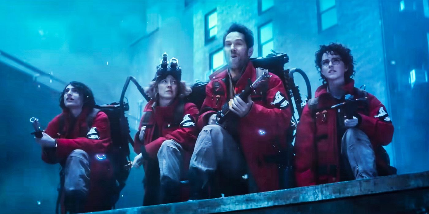 Team from Frozen Empire wearing red Ghostbuster suits