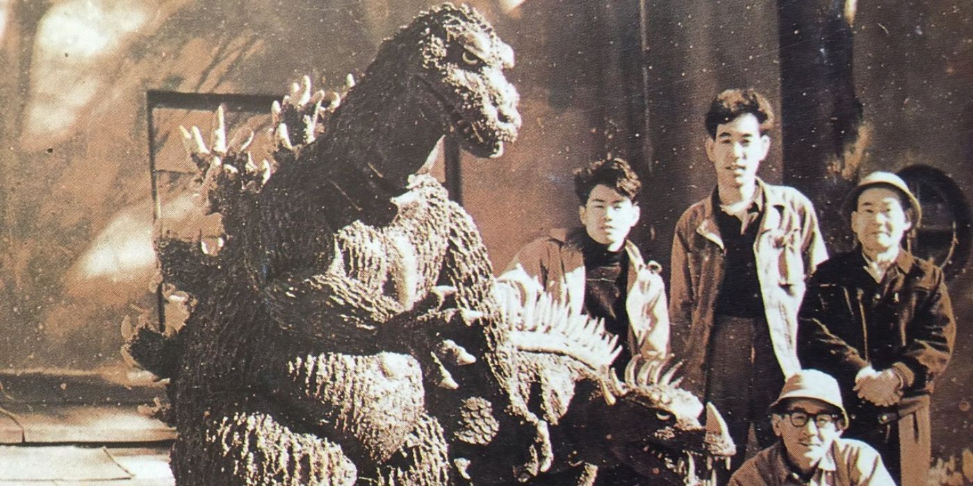 Teizo Toshimitsu, Eizo Kaimai, Yasuei Yagi, and Yoshio Suzuki with Godzilla and Anguirus models for The Volcano Monsters