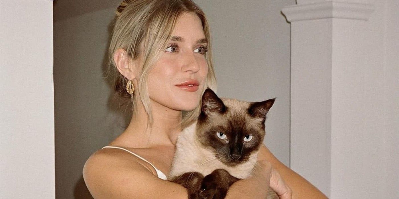 The Bachelor Season 28 Contestant Sydney Gordon Holding A Cat
