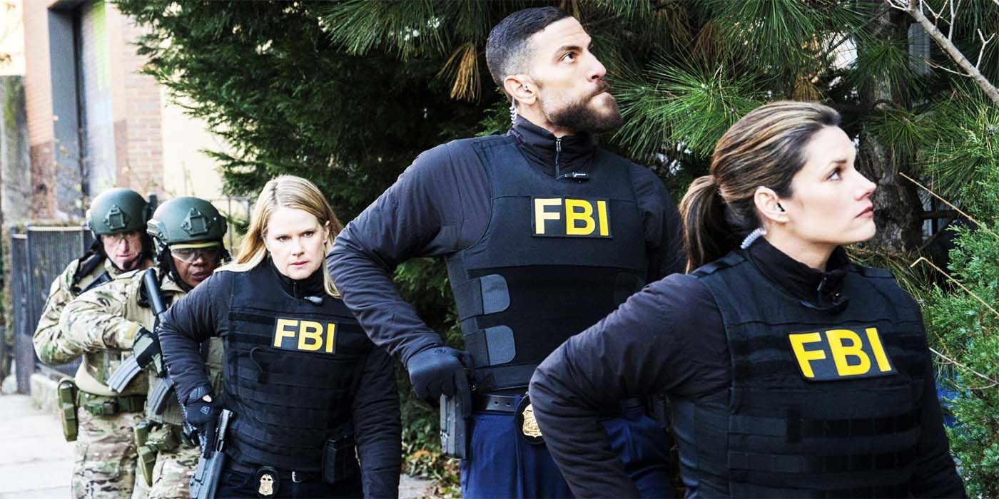 The cast of FBI wearing tactical gear about to enter a building