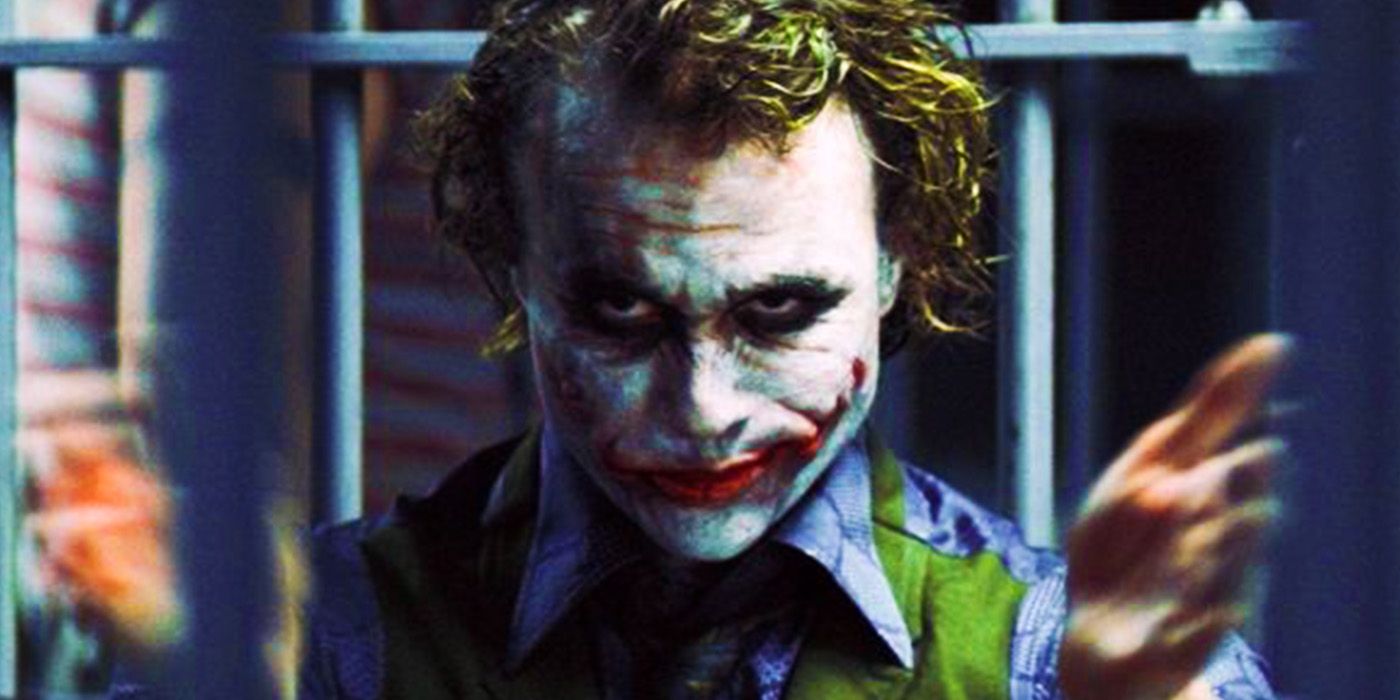 The Joker clapping in jail in The Dark Knight