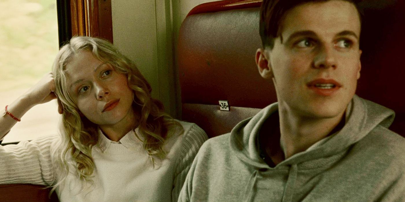 The Postcard Killings Sylvia and Mac on the train