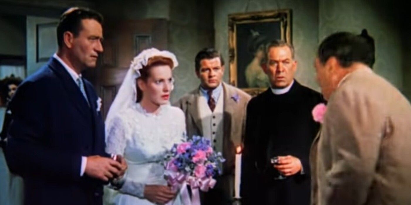 John Wayne dans le rôle de Sean Thornton et Maureen O'Hara dans le rôle de Mary Kate Danaher se marient dans The Quiet Man (1952) 