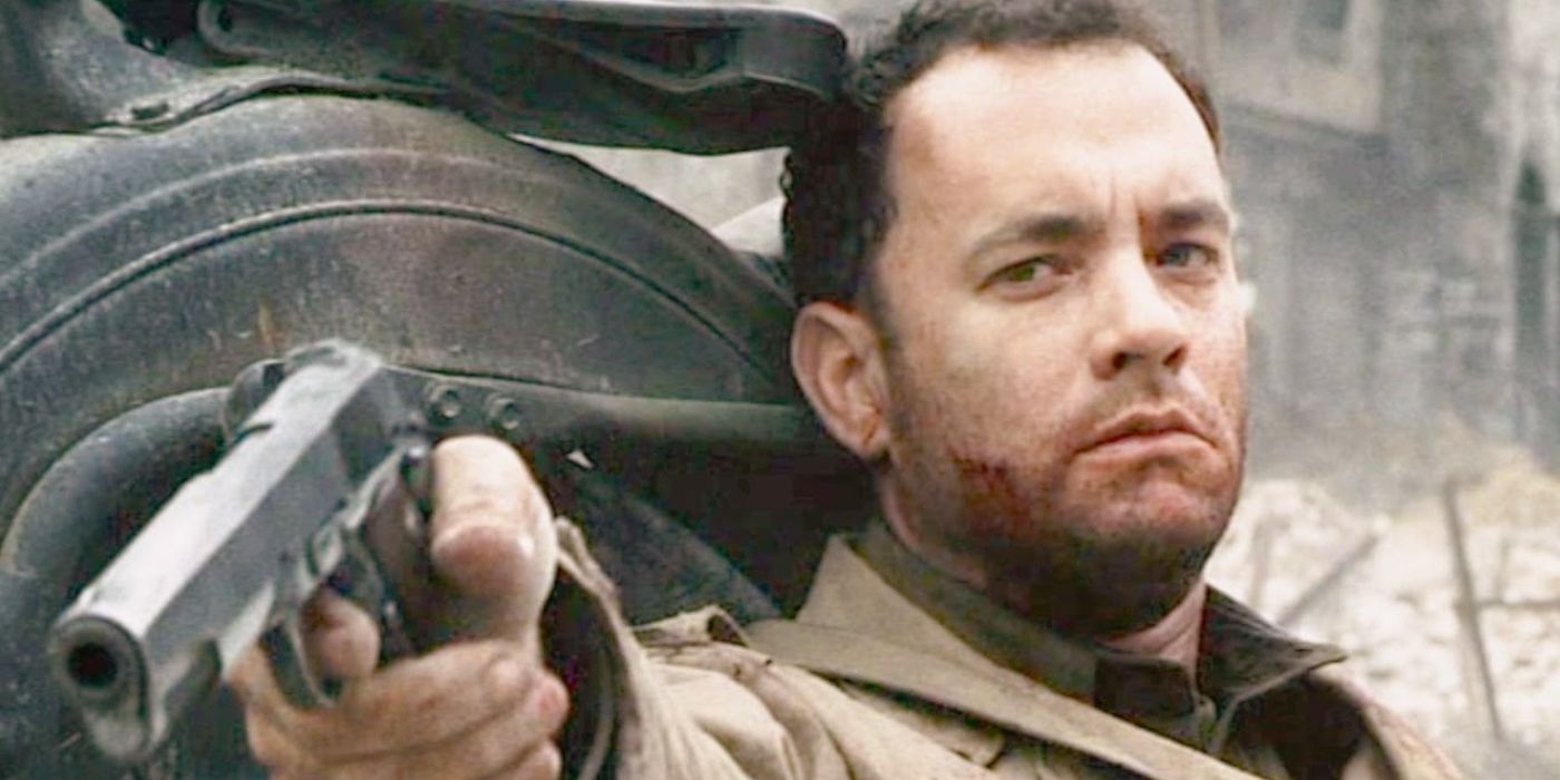 A wounded Tom Hanks aiming a pistol in Saving Private Ryan