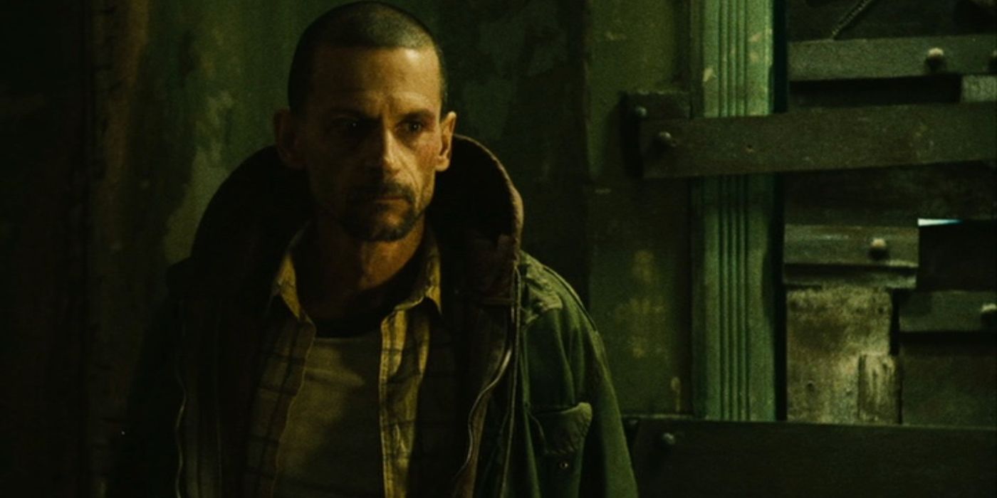 Timothy Burd as Obi Tate in Saw II