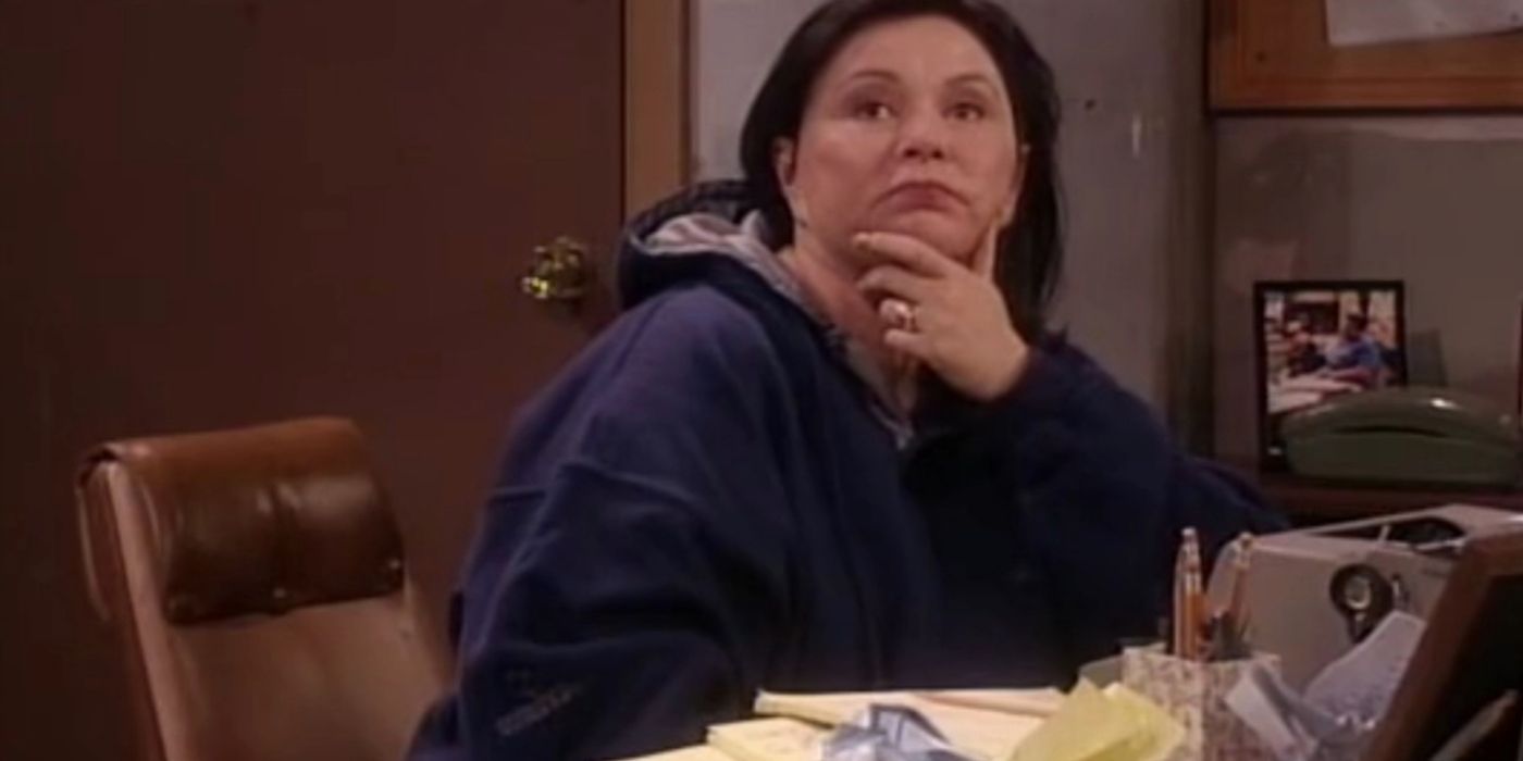 Roseanne sits at her desk writing in the season 9 episode Into That Good Night