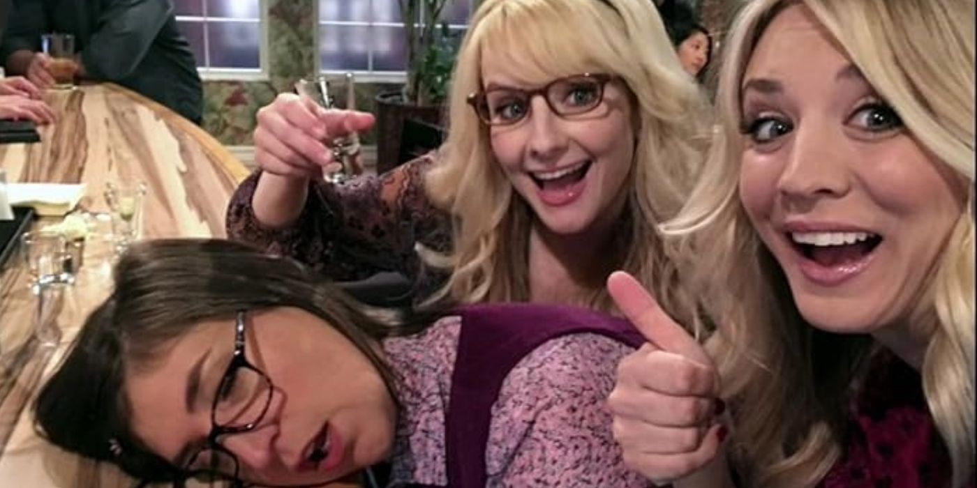 Bernadette and Penny's selfie with Amy passed out on the bar